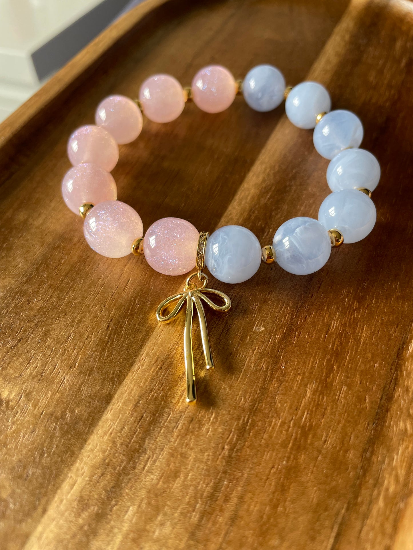 Blush & Blue beaded Bracelet with Bow Charm